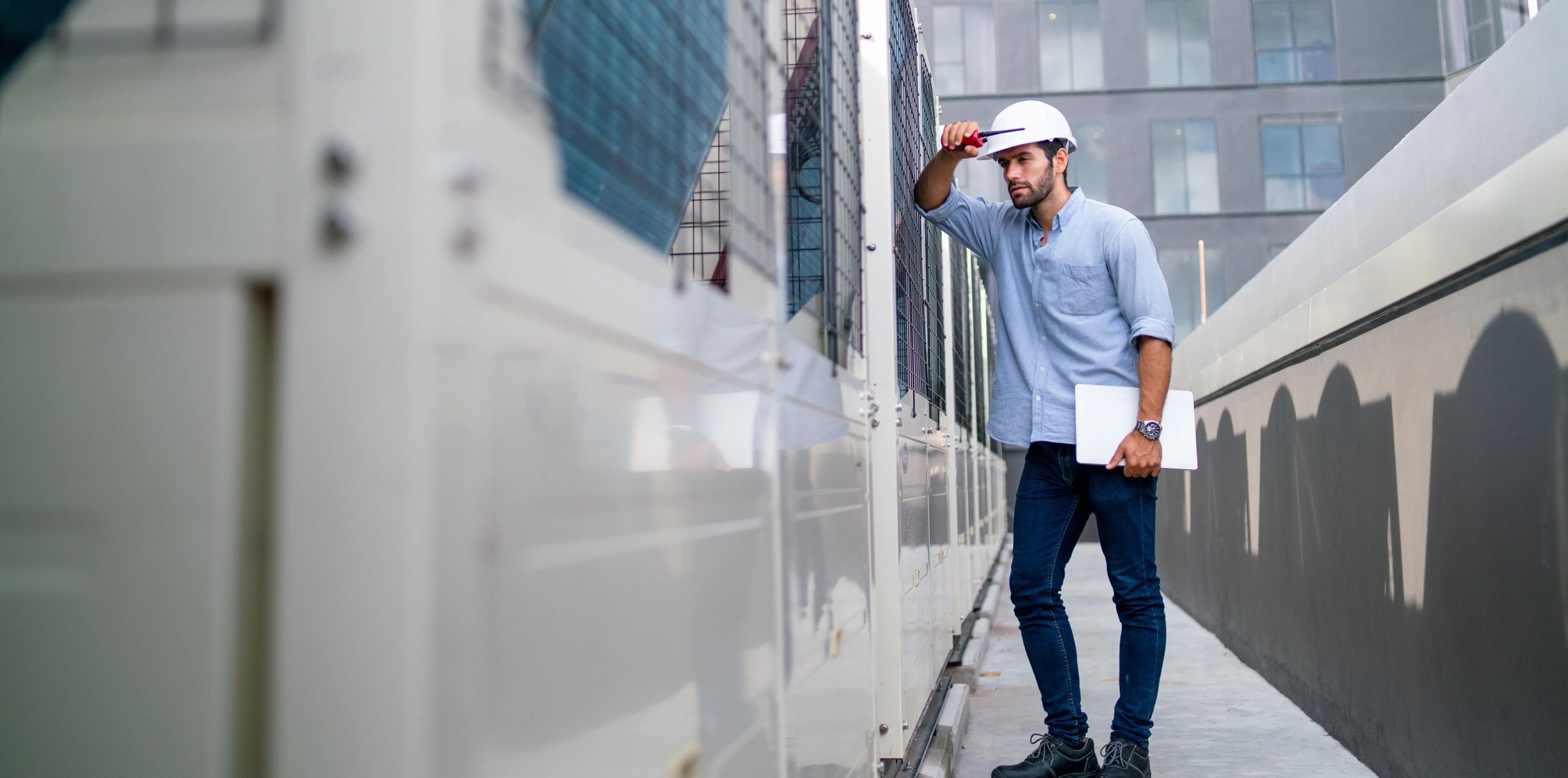 Engineer reviewing equipment on a construction site